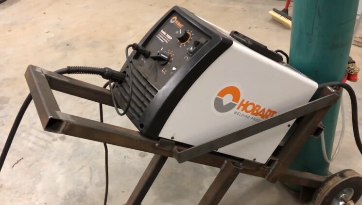 A welding cart created by Hobart 140 unit